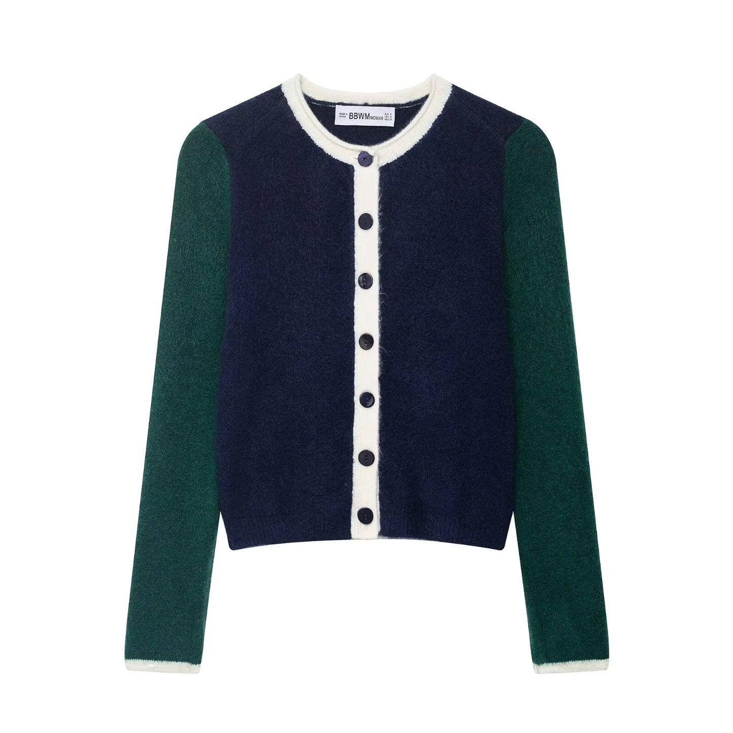 Two-tone cardigan with green sleeves and navy body on a white background