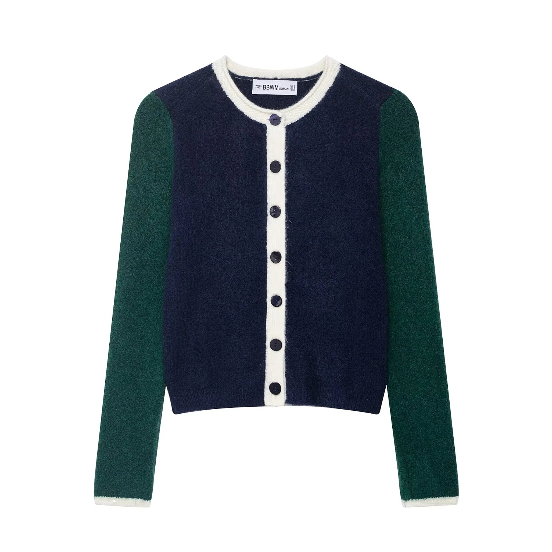 Two-tone cardigan with green sleeves and navy body on a white background
