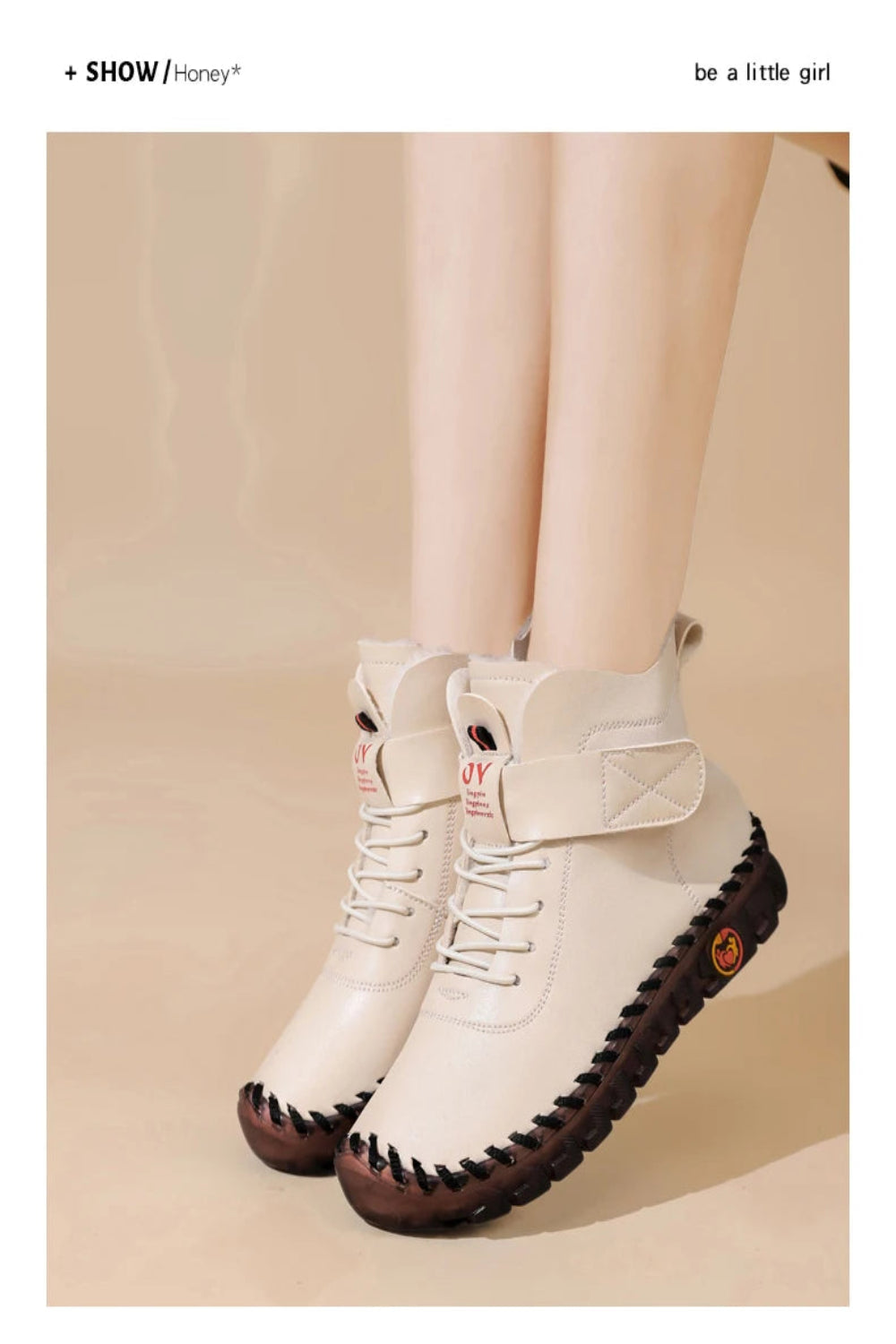 White ankle boots with brown soles on a beige background