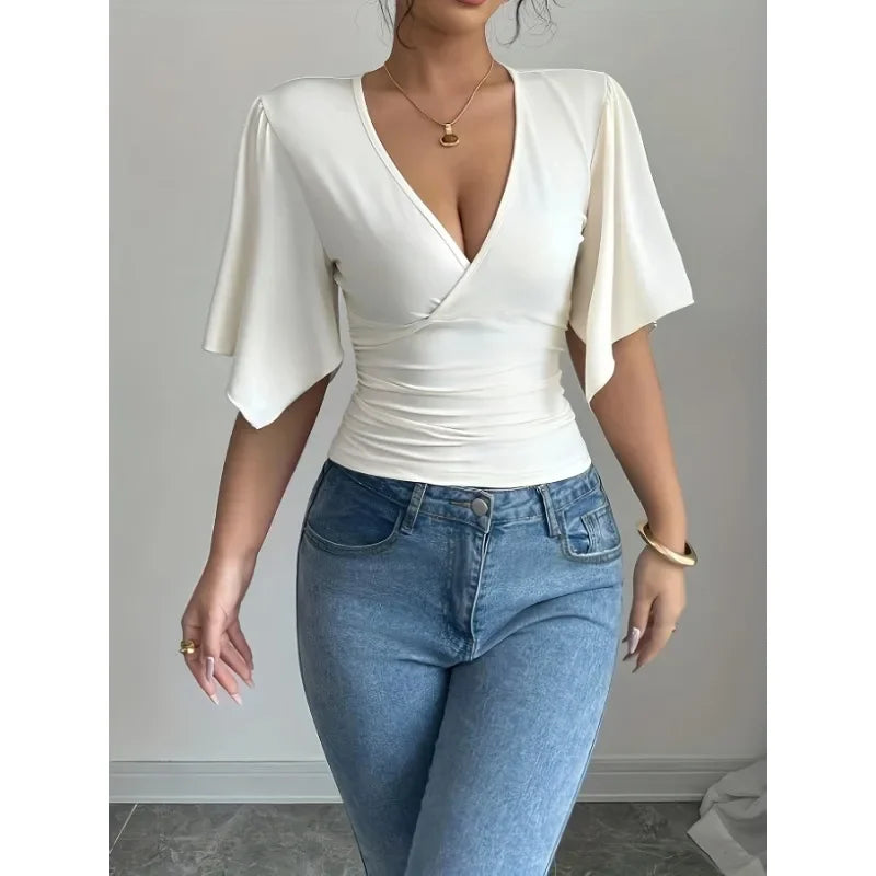 Modern Feminine: Slim-Fit V-Neck Shirred Knit Top