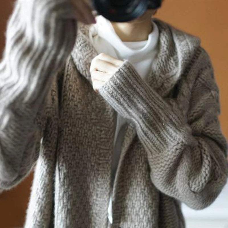Sophisticated Layering: The Chic Sleeveless Hooded Knit Vest
