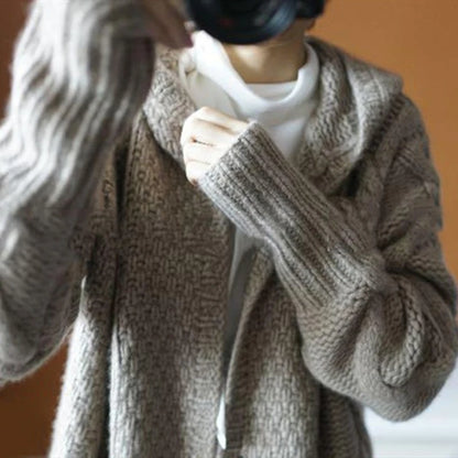 Sophisticated Layering: The Chic Sleeveless Hooded Knit Vest