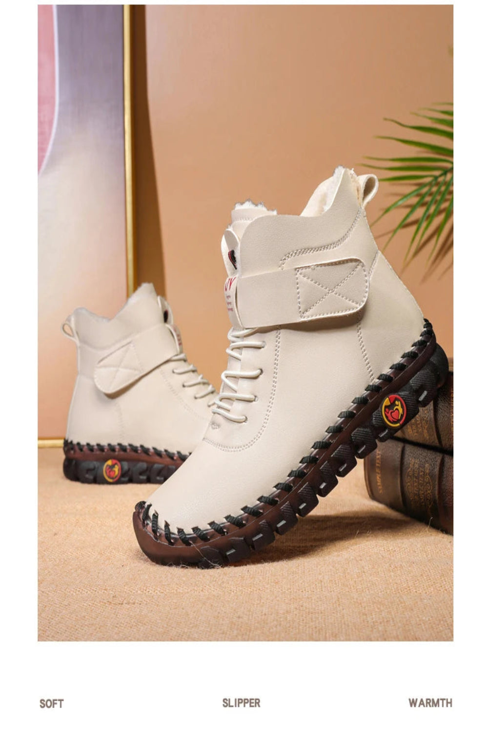 White boots with brown soles on a beige surface