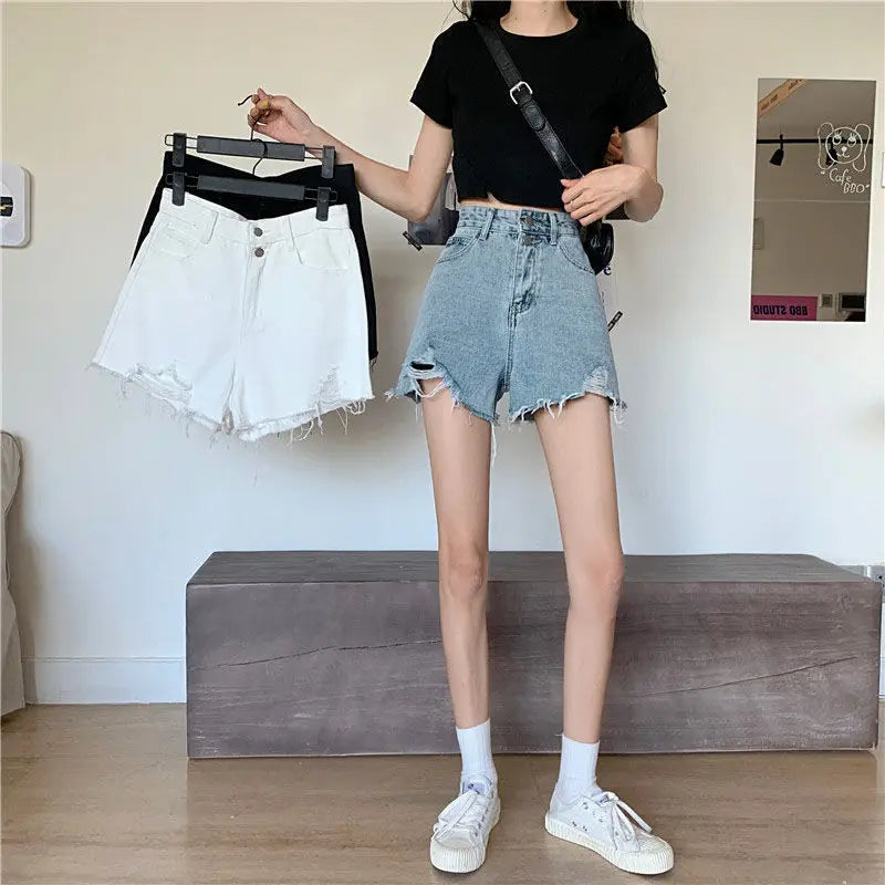 90s Grunge Aesthetic: Distressed High-Waist White Denim Shorts