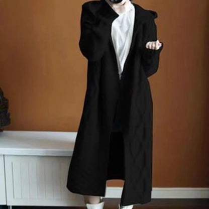 Sophisticated Layering: The Chic Sleeveless Hooded Knit Vest