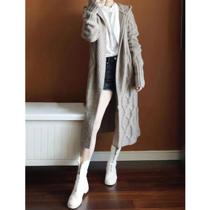 Sophisticated Layering: The Chic Sleeveless Hooded Knit Vest