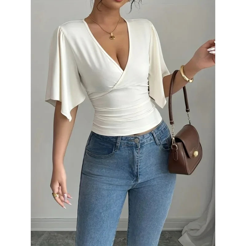 Modern Feminine: Slim-Fit V-Neck Shirred Knit Top