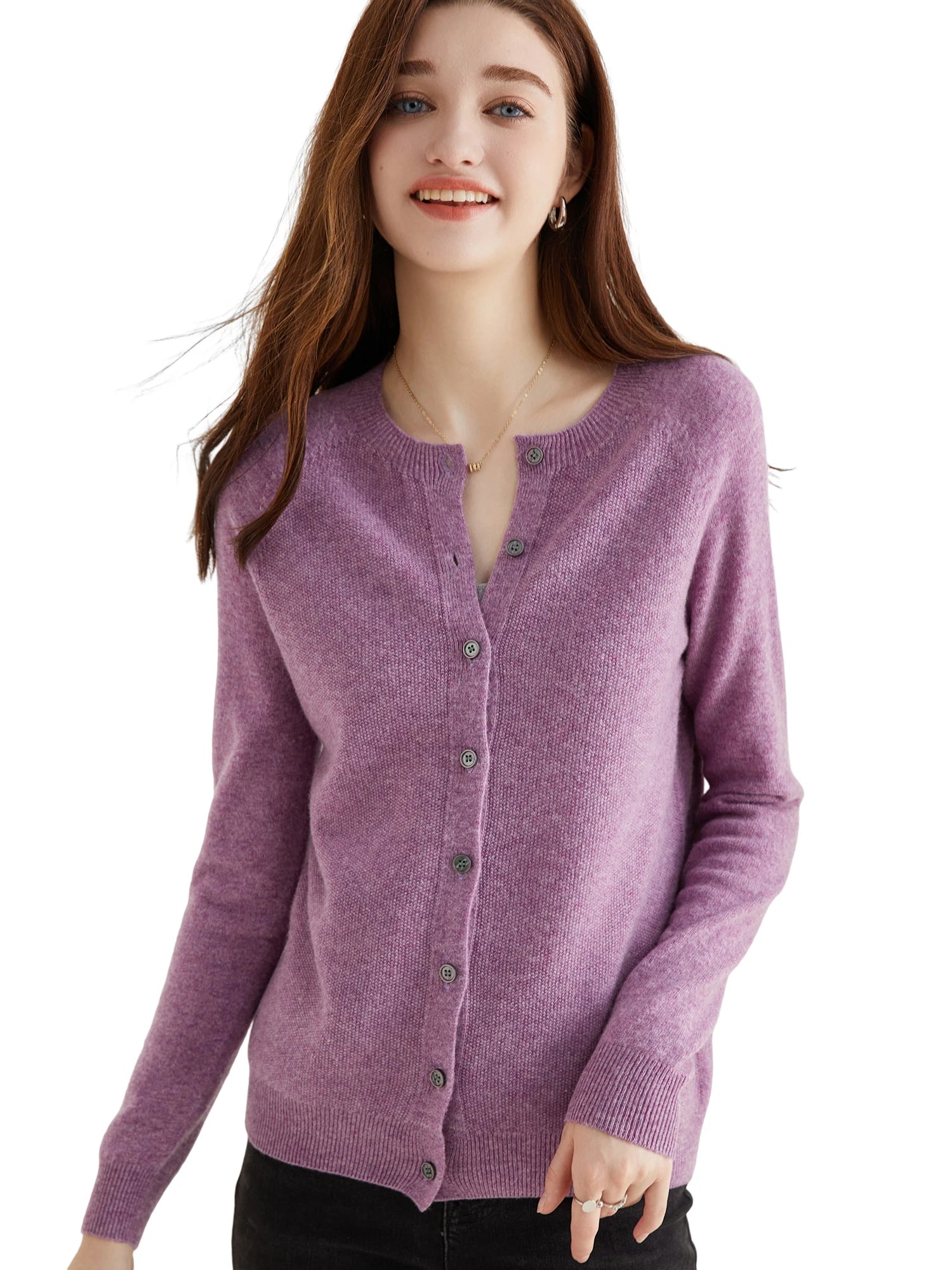 Woman wearing a purple cardigan on a white background