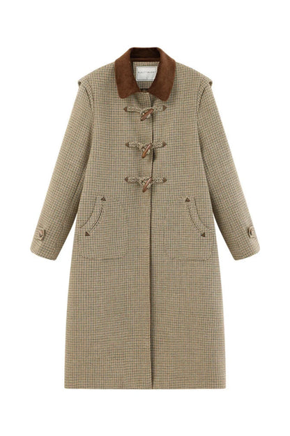 Houndstooth patterned coat with brown collar on a white background