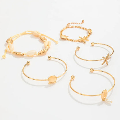 Greek Goddess Vibes - Elegant Gold Sea Shell Charm Bracelet Stack