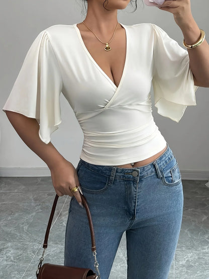 Modern Feminine: Slim-Fit V-Neck Shirred Knit Top