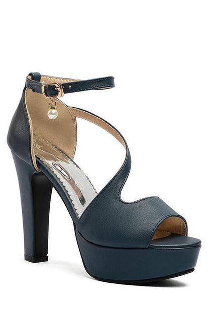Blue high-heeled sandal on a white background