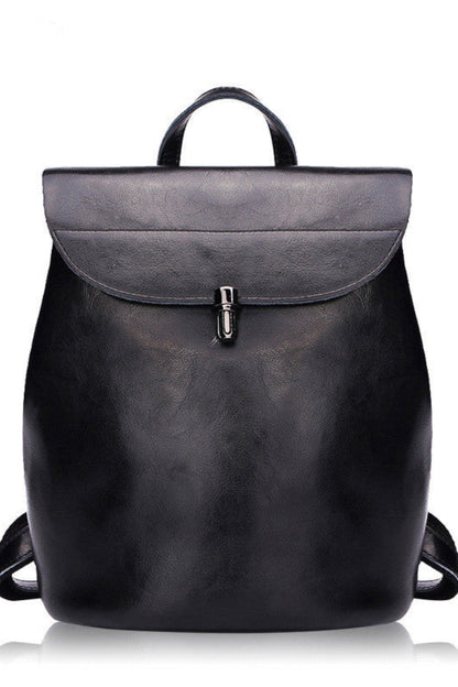 Black backpack on a white background