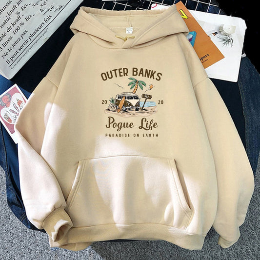 Beige hoodie with 'Outer Banks Pogue Life' graphic on a textured surface