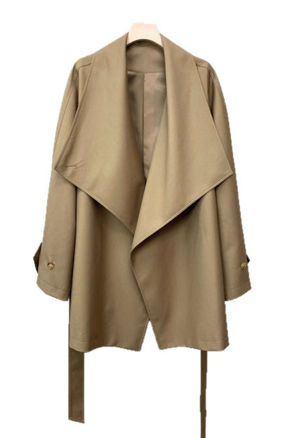 Beige trench coat on a white background