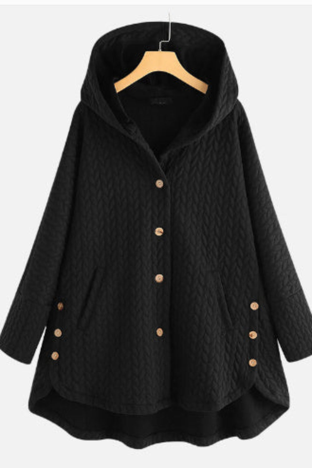 Black hooded coat with button details on a hanger against a white background