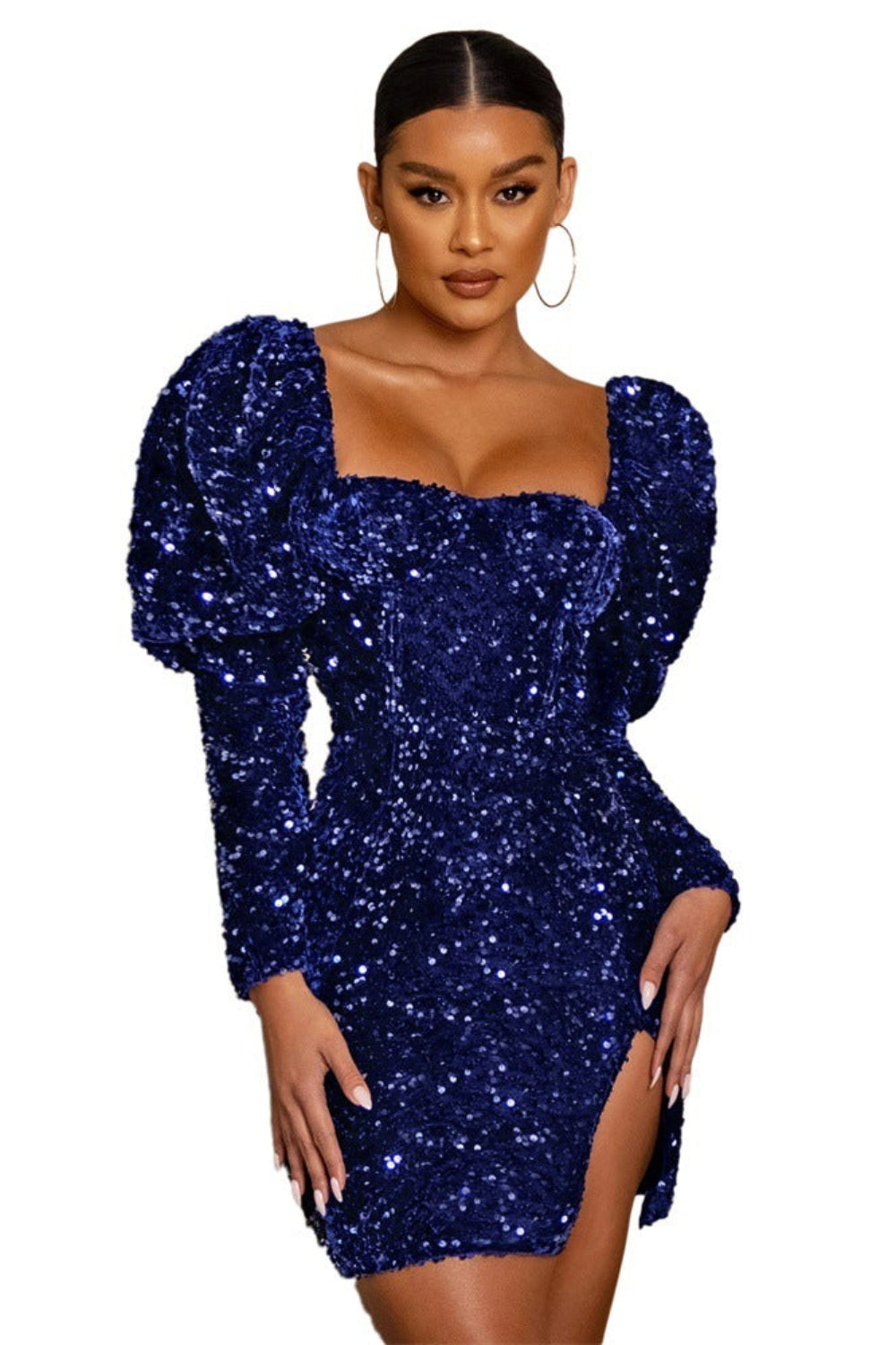 Woman wearing a blue sequin dress on a white background