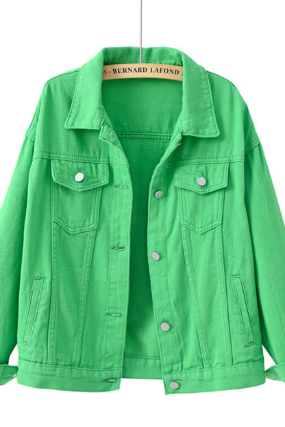 Green denim jacket on a white background