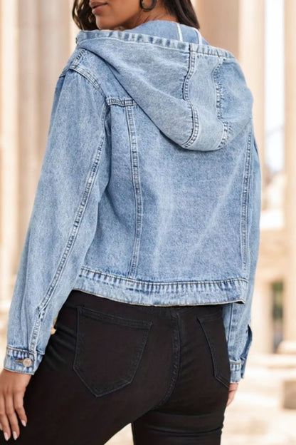 Denim jacket with hood worn by a person outdoors