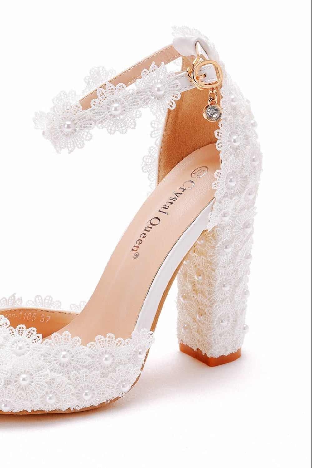 White lace high-heeled shoes on a white background
