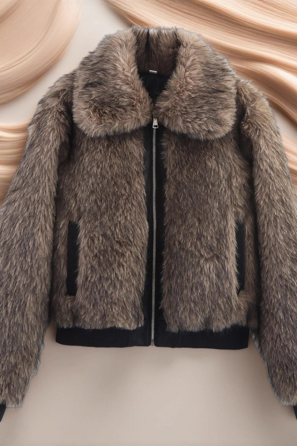 Brown fur jacket on a beige background